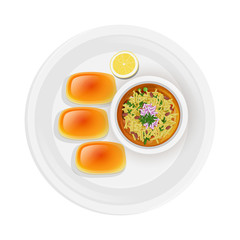 Top view of Maharashtrian dish Misal Pav on plate.