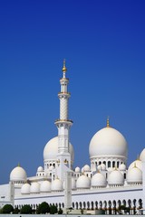 Fototapeta na wymiar low angle view on minaret of sheikh zayed grand mosque