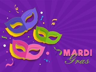 Mardi Gras poster or template design with party masks on purple ray background.