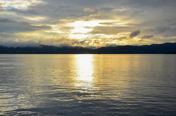 Sunset over a Norwegian archipelago. Seascape.