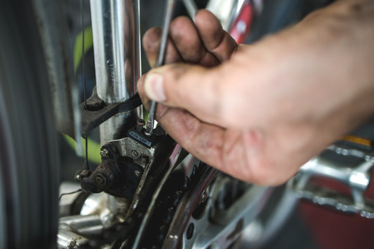 Fixing the bicycle problem in workshop,stock photo
