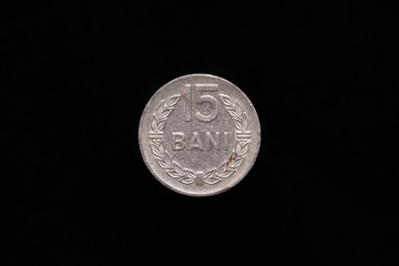 Romanian People's Republic old 15 Bani coin from 1960, reverse. Isolated on black background
