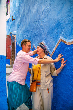 Loving couple in the famous blue city.