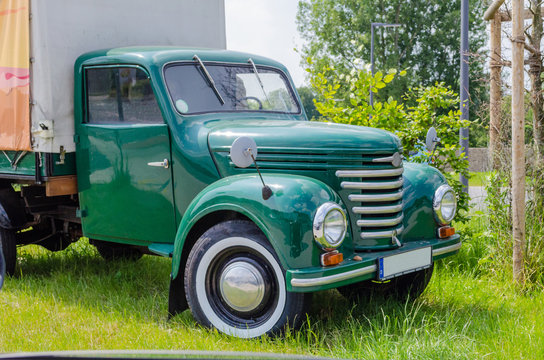 Rheine, Nrw, Germany - March 13, 2014: In Rheine on the main road out of town. Old truck parked on the street, to advertising. Oldtimer constructed from the year 1954 to 1961 in the former GDR in the 