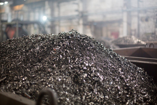 Pieces of ferrotitanium closeup. Ferroalloy used for alloying, deoxidation and degassing of steels and alloys