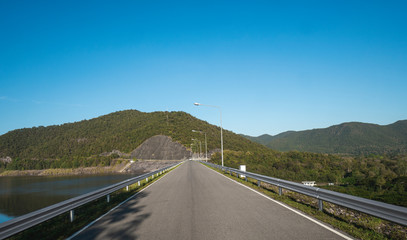 Safety steel barrier on freeway bridge designed to prevent the exit of the vehicle from the curb or bridge.