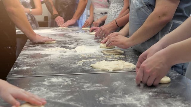 Master Class for the preparation of bread from flour, fresh dough. Baking bread
