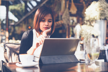 Asian woman in cafe