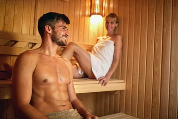 Foto op Canvas Man and woman in sauna © luckybusiness