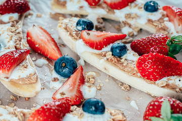 Banana Split With Strawberries, Blueberries, Almond Butter And Honey