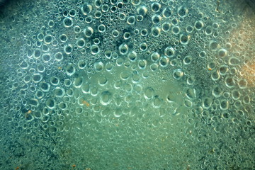 Close up Drop of Water inside Old Bollard Lamp.
