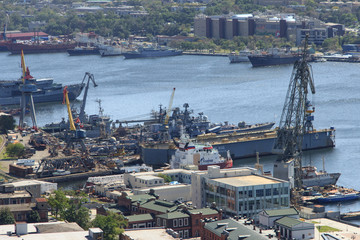 Vladivostok, Russia - September,19, 2019: Dalzavod is the oldest ship repair plant in the Russian Far East. The main factory for the repair of warships of the Pacific Fleet of Russia.