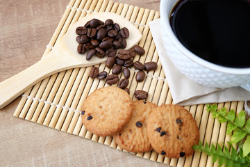 Coffee in a cup and cookies with served
