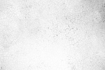 White Cracked Concrete Wall Texture Background with Light Leak from the Right.