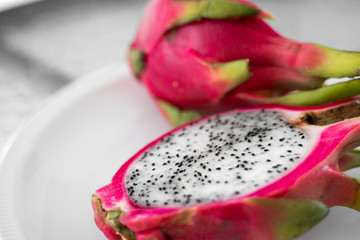 Dragon fruit. Vibrant Dragon Fruit on white background. Sliced white dragon fruit or pitaya on...