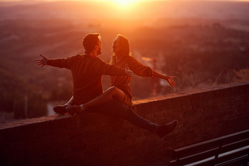 Lovers. romantic at sunset. man and woman smiling and enjoying together