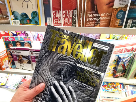 Conde Nast Traveller magazine in a hand