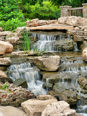 Naklejka premium Peaceful waterfall rock garden