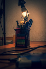 Dark room with some pencils