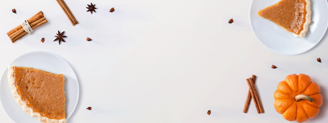 Pumpkin pie with autumn pumpkin - overhead view © Tierney