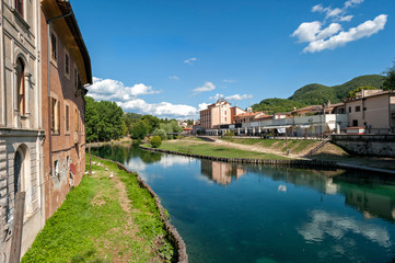 Rieti, city of central Italy. Velino river with old houses and geese that swim, - obrazy, fototapety, plakaty