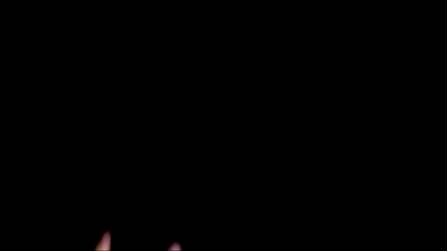 Rock music rock and roll dual hand sign on a chroma key black screen, closeup 