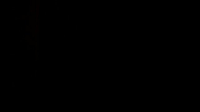 Horizontal rock music hand devil sign on a chroma key black screen, static shot 