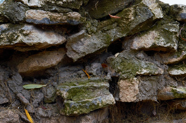 old stone wall outdoors for background, texture