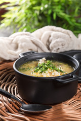 Barley soup with vegetables and chicken.