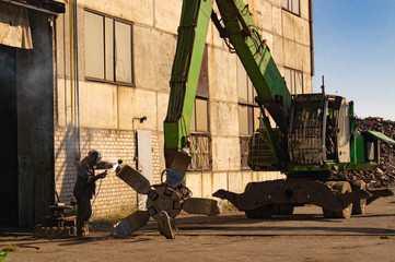  Dnipro, Dnepropetrovsk region / Ukraine - 01/10/2019: Repair of a manipulator equipped with a seam.