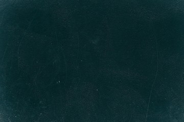 Scratches on the Black Wall Background.