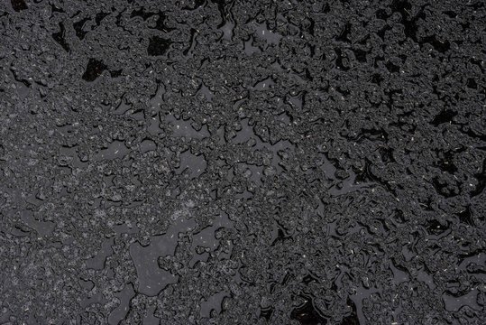 black wet asphalt background