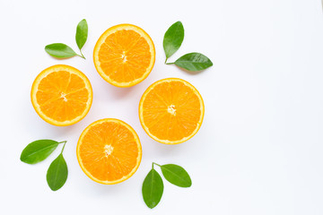 Fresh orange citrus fruit with leaves isolated on white background.