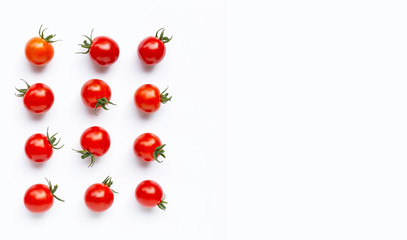 Fresh cherry tomatoes on white background.