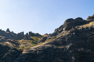 Kara-Dag mountains, view of the rocks from the sea, Crimea, Russia.