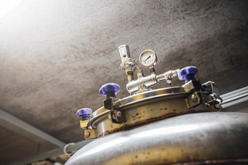 Craft beer brewing equipment in brewery! Alcoholic drink production