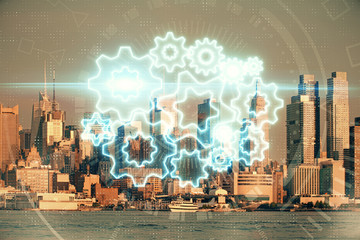 Double exposure of business theme hologram drawing and city veiw background. Concept of success.