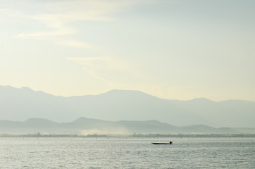 peaceful of lake with mountain view at Phayao lake in Thailand