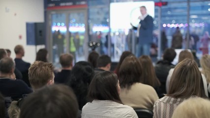 Audience listens lecturer at workshop