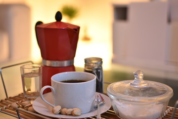 cup of coffee with teapot and cup of tea