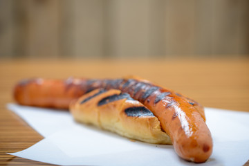 Char-grilled Jumbo hotdog  in a brioche roll