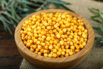 sea buckthorn on a wooden background
