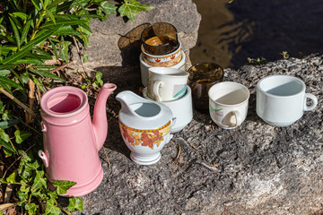 pitchers, cups, carafes, bowls, glasses outdoors