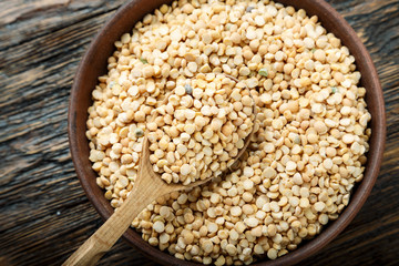 dry peas on a wooden background