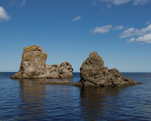 Fototapeta na wymiar A beautiful rock formations near the coast of the Sea of Okhotsk. Cape Velikan, island Sakhalin, Russia