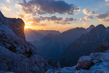 Purple Mountain Sunset with Sun Star