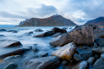 Beautiful blue sea with magnificent mountain in Lofoten in sunset