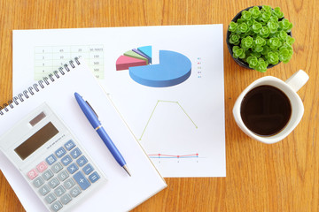 graph paper and note book in business concept