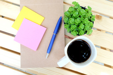 note paper on wooden table