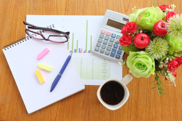 graph paper and note book in business concept